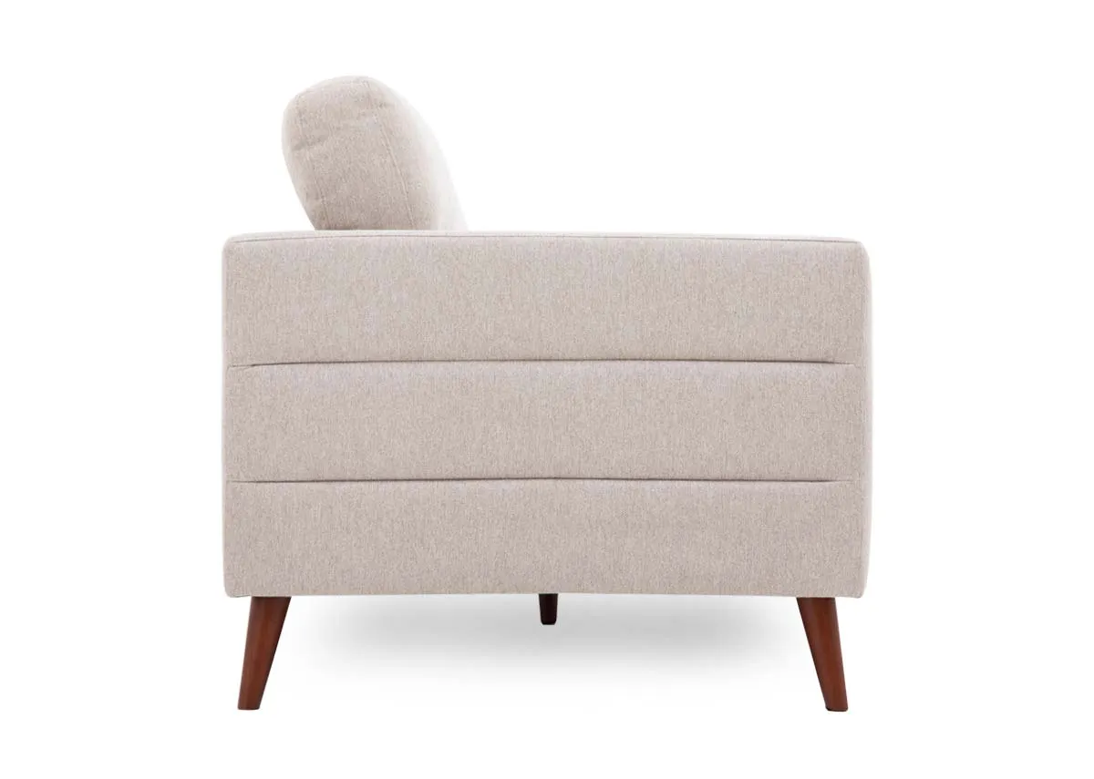 A 3 seater beige fabric sofa from EZ Livings Presley range.Side view of seamed detail