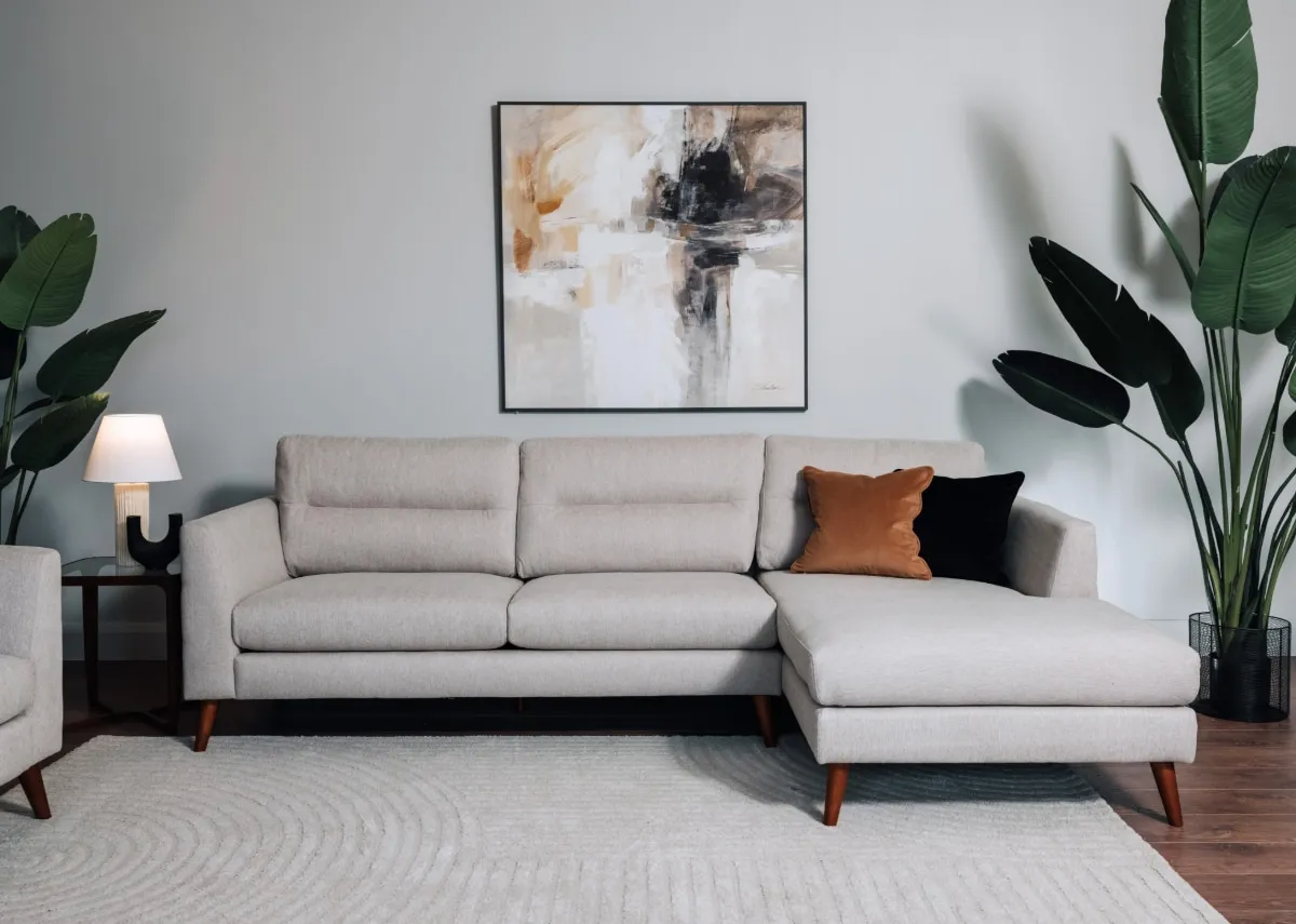 A lifestyle image of the Presley Beige RHF Chaise with Evolution canvas