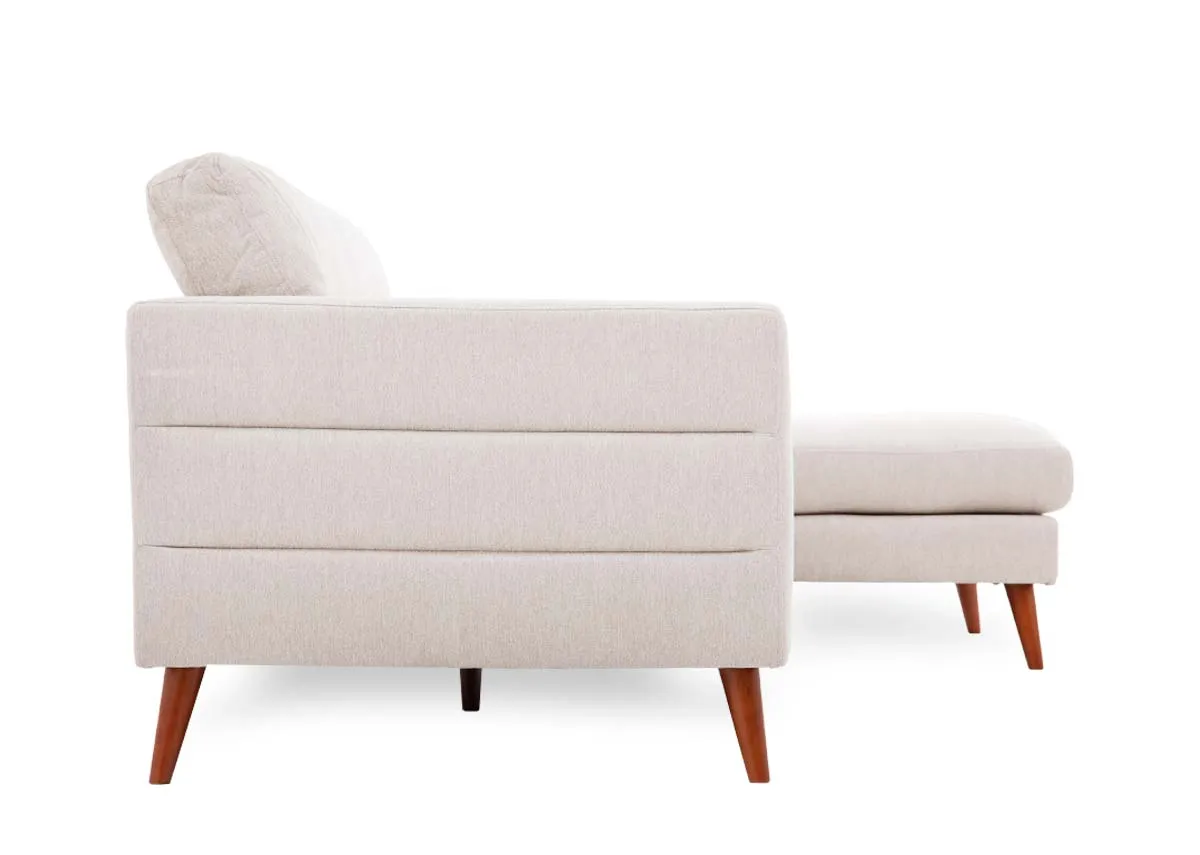 A beige corner chaise from EZ Livings Presley range. Side view of seamed sides