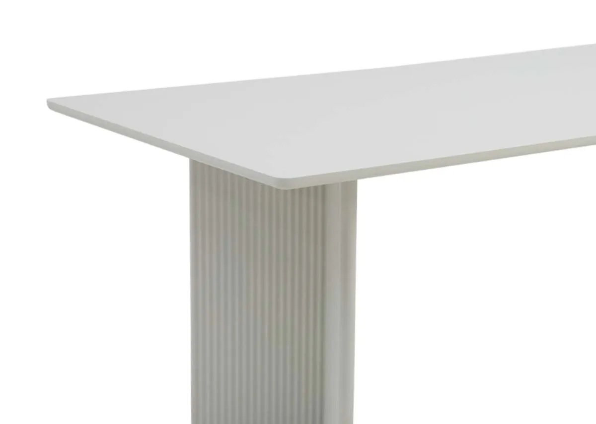 A large rectangular dining table in off white from EZ Livings Palma range. Closeup of pine and ceramic mix top