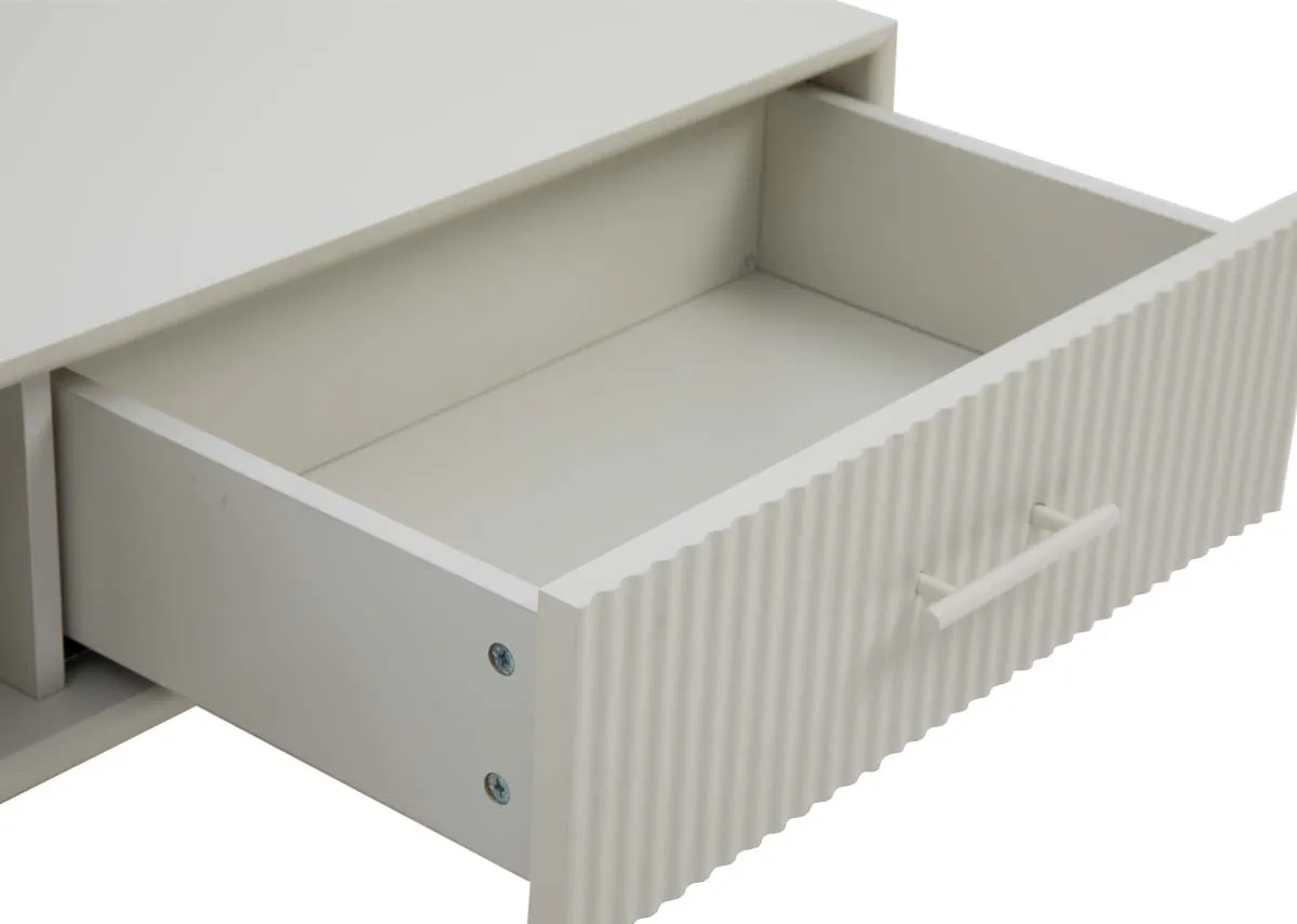 A white rectangular coffee table from EZ Livings Palma range. Closeup of ridge detail on drawer front.
