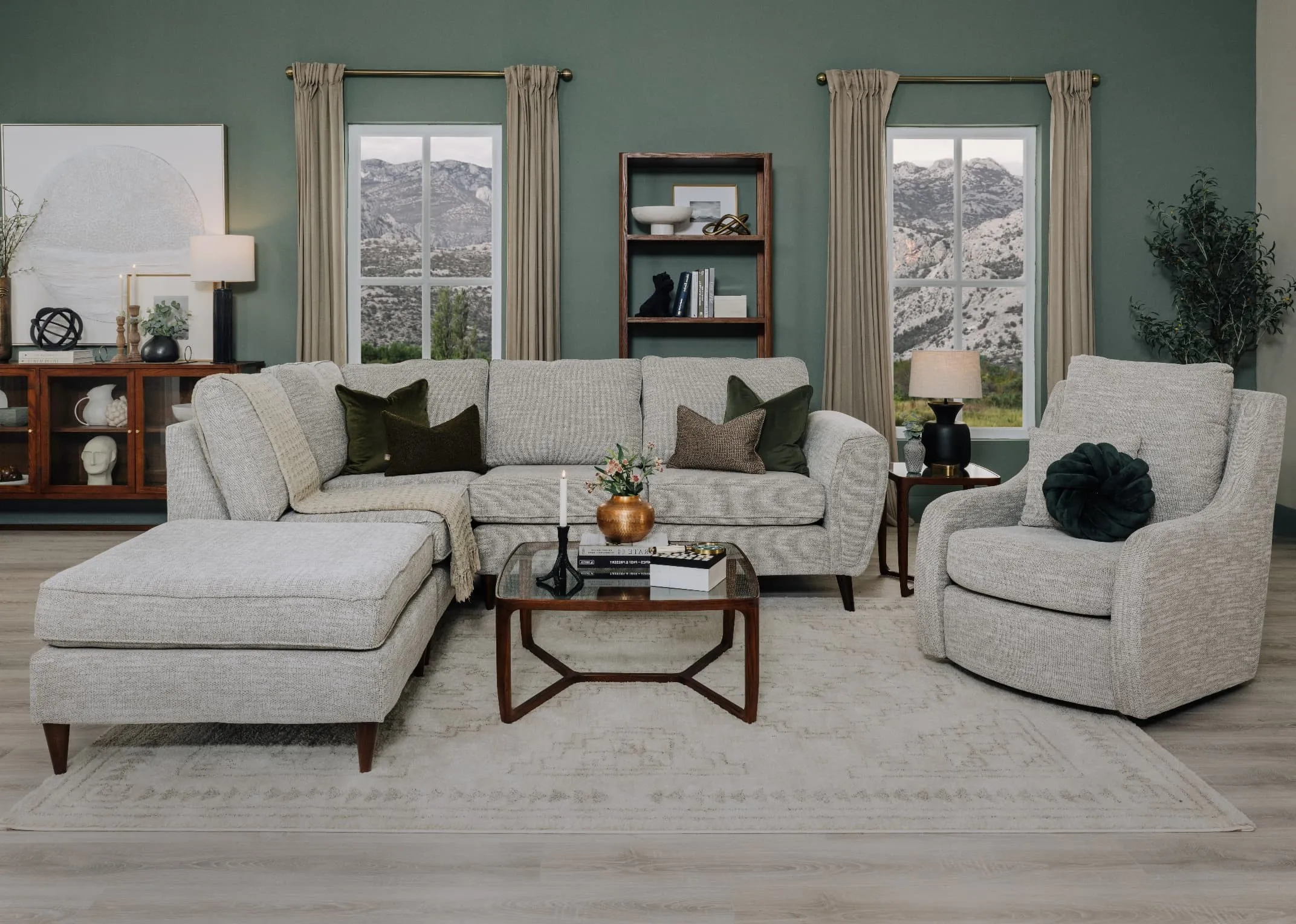 A lifestyle image of the Bella Corner sofa with swivel chair and Cameo coffee table.