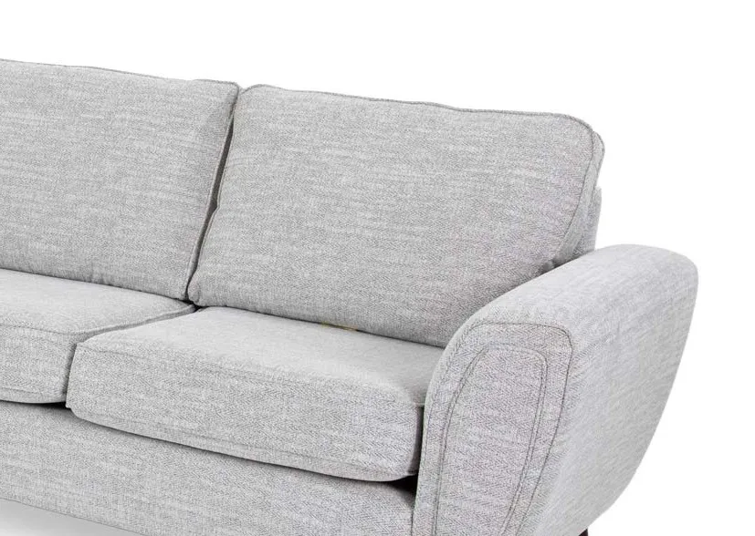 A silver fabric RAF corner chaise from EZ Livings Bella range.Closeup of silevr fabric.