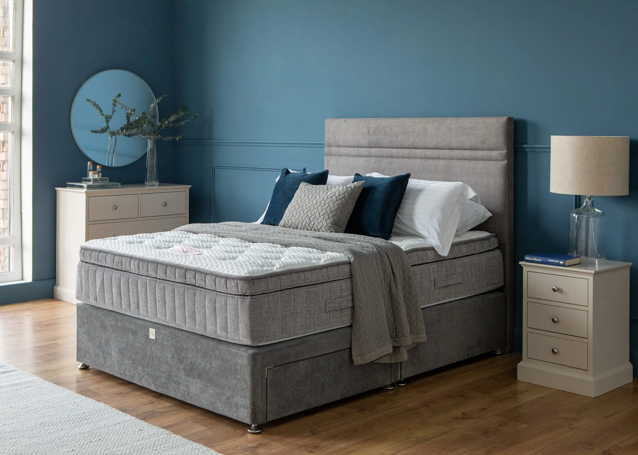 A lifestyle image of the Therma Cool 2000 on a divan bed base with brunel bedside lockers & karina lamps.