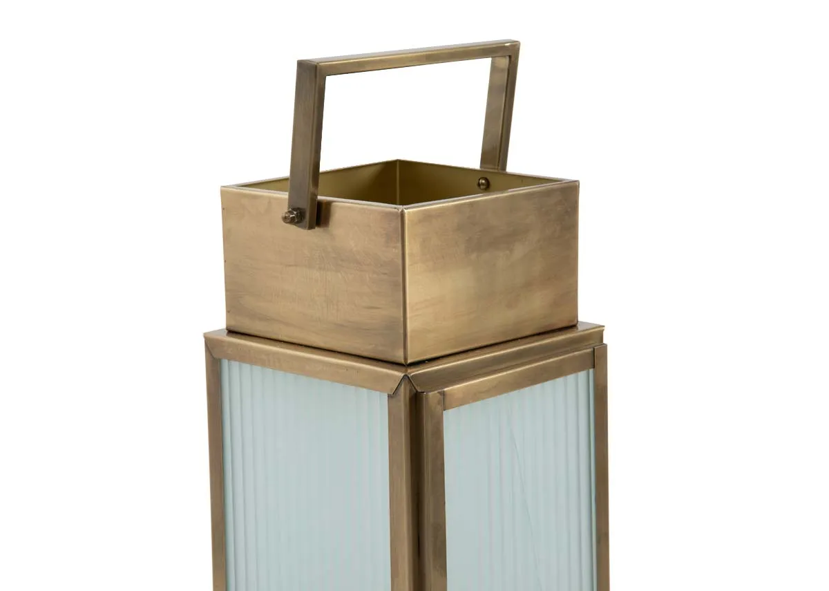 A small gold metal framed lantern from EZ Livings Dalia range. Closeup of gold handle
