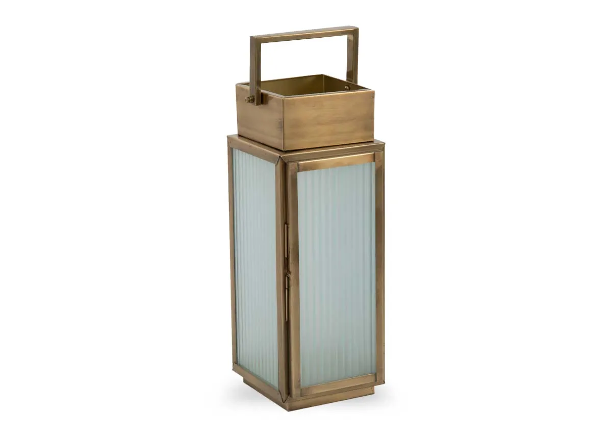A small gold metal framed lantern from EZ Livings Dalia range. Angled view of frosted glass sides.