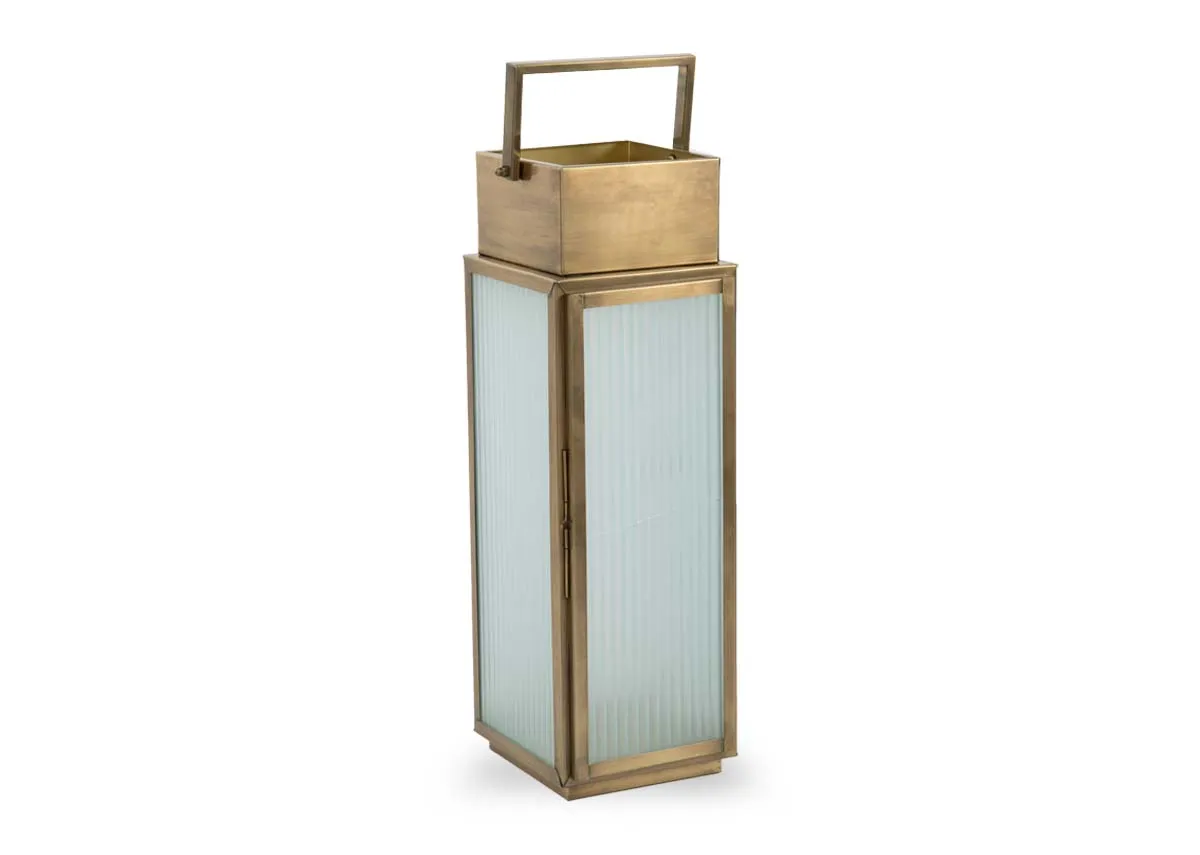 A large gold metal framed lantern from EZ Livings Dalia range. Angled view of frosted glass sides.
