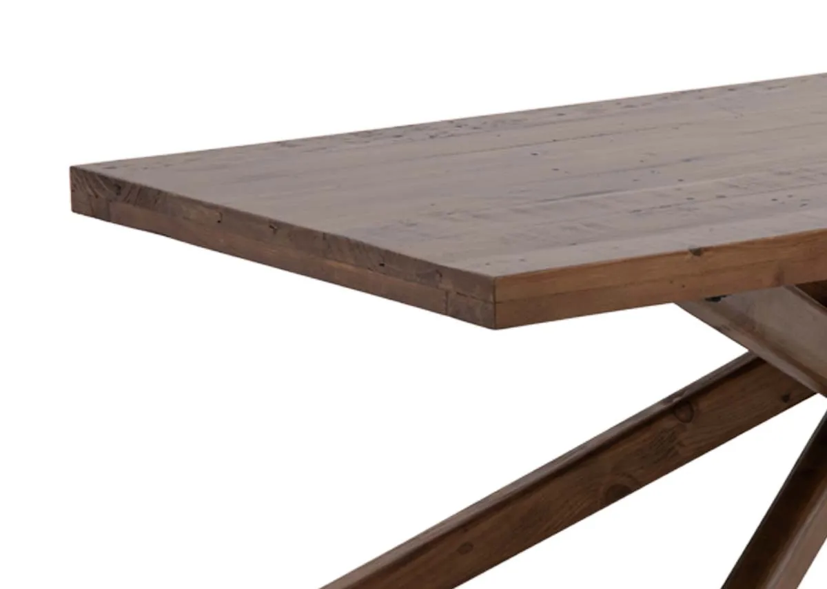 A brown chunky top reclaimed wood dining table from EZ Livings Albion range. Closeup of cashew wood finish