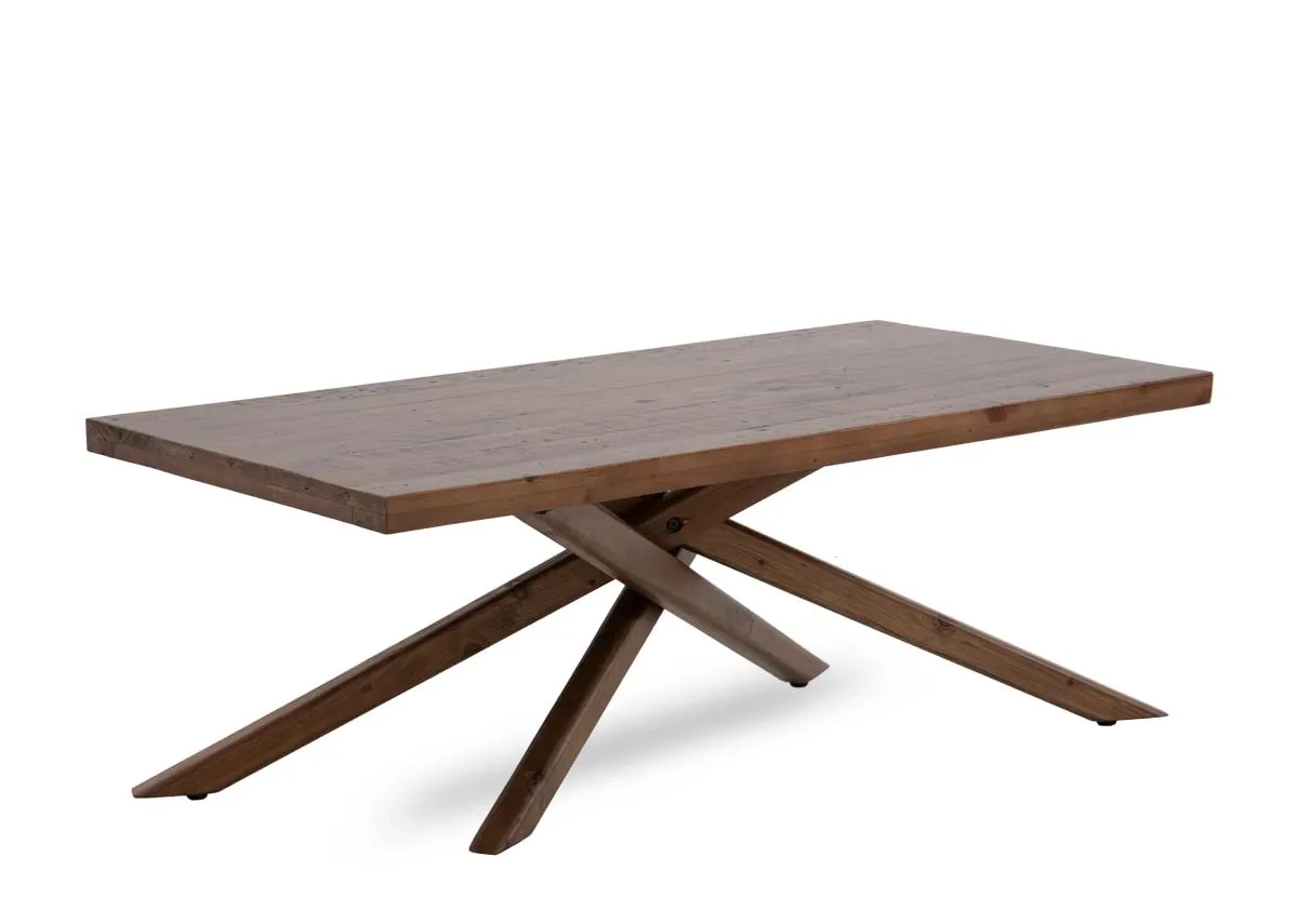 A brown chunky top reclaimed wood dining table from EZ Livings Albion range. Angled view of criss cross legs