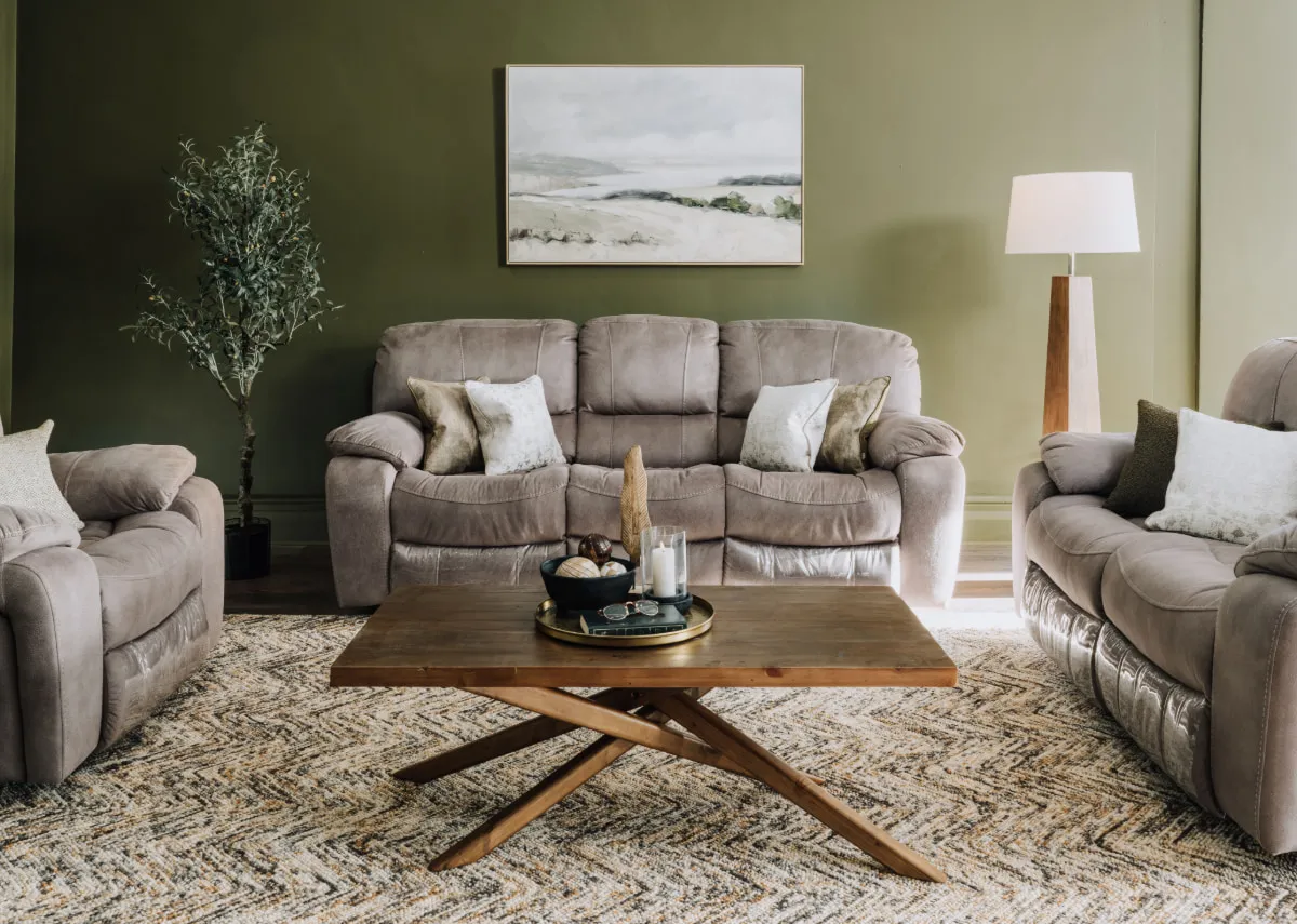 A lifestyle image of the Bradford sofa range with the Albion coffee table & coastland print