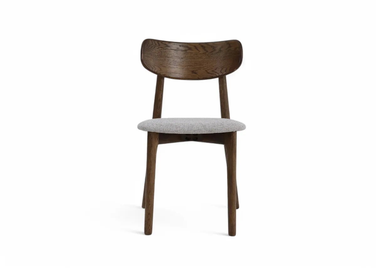 A smoked oak frame dining chair with cream fabric seat from EZ Livings Bari range. Front view of arched oak back rest