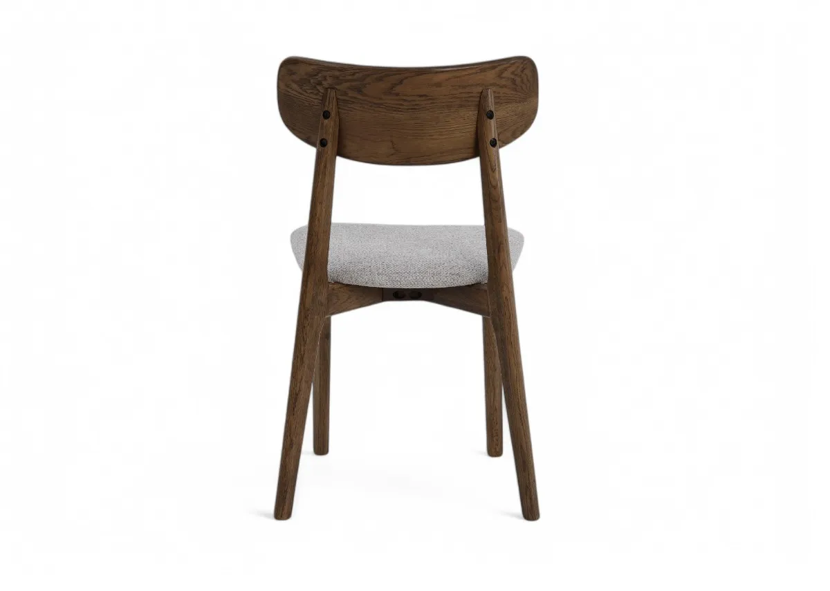 A smoked oak frame dining chair with cream fabric seat from EZ Livings Bari range. Back view