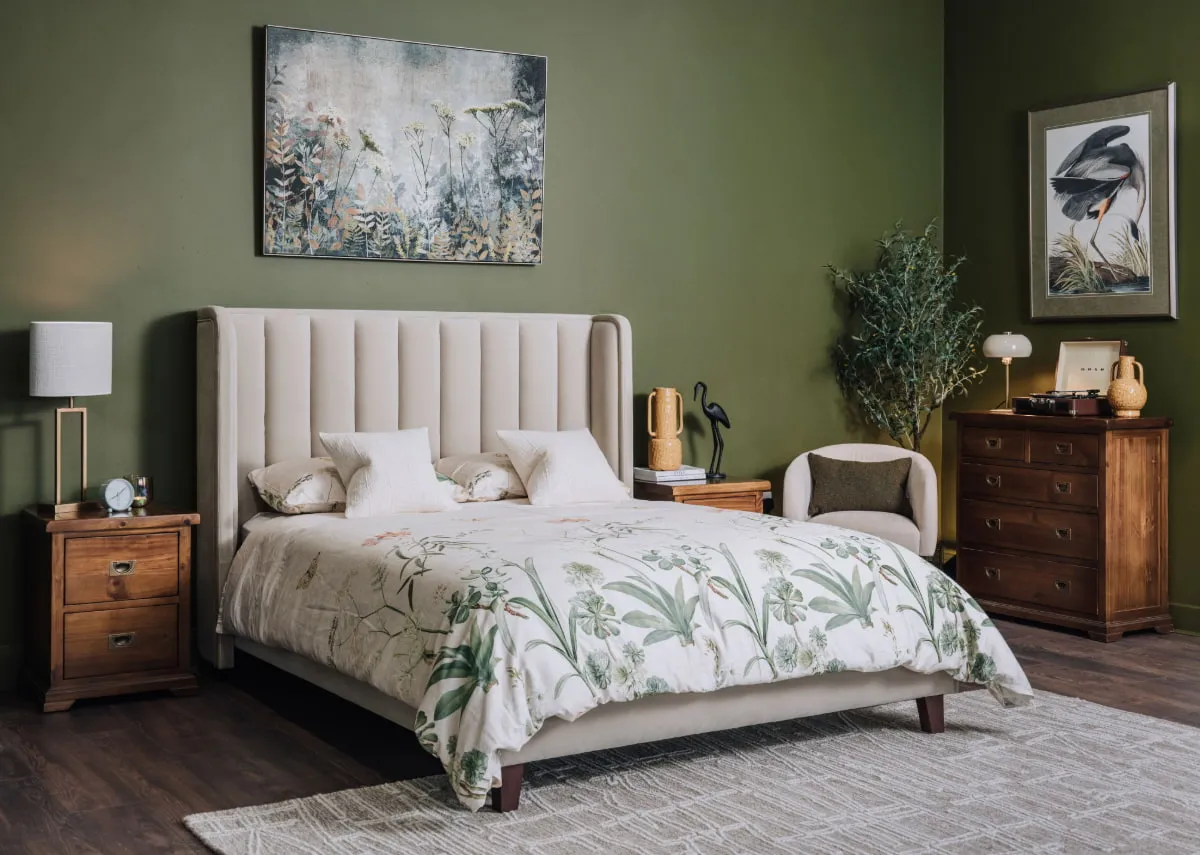 A lifestyle image of the Lowe beige bedframe with Aisling lockers and chest with Fanciful canvas.