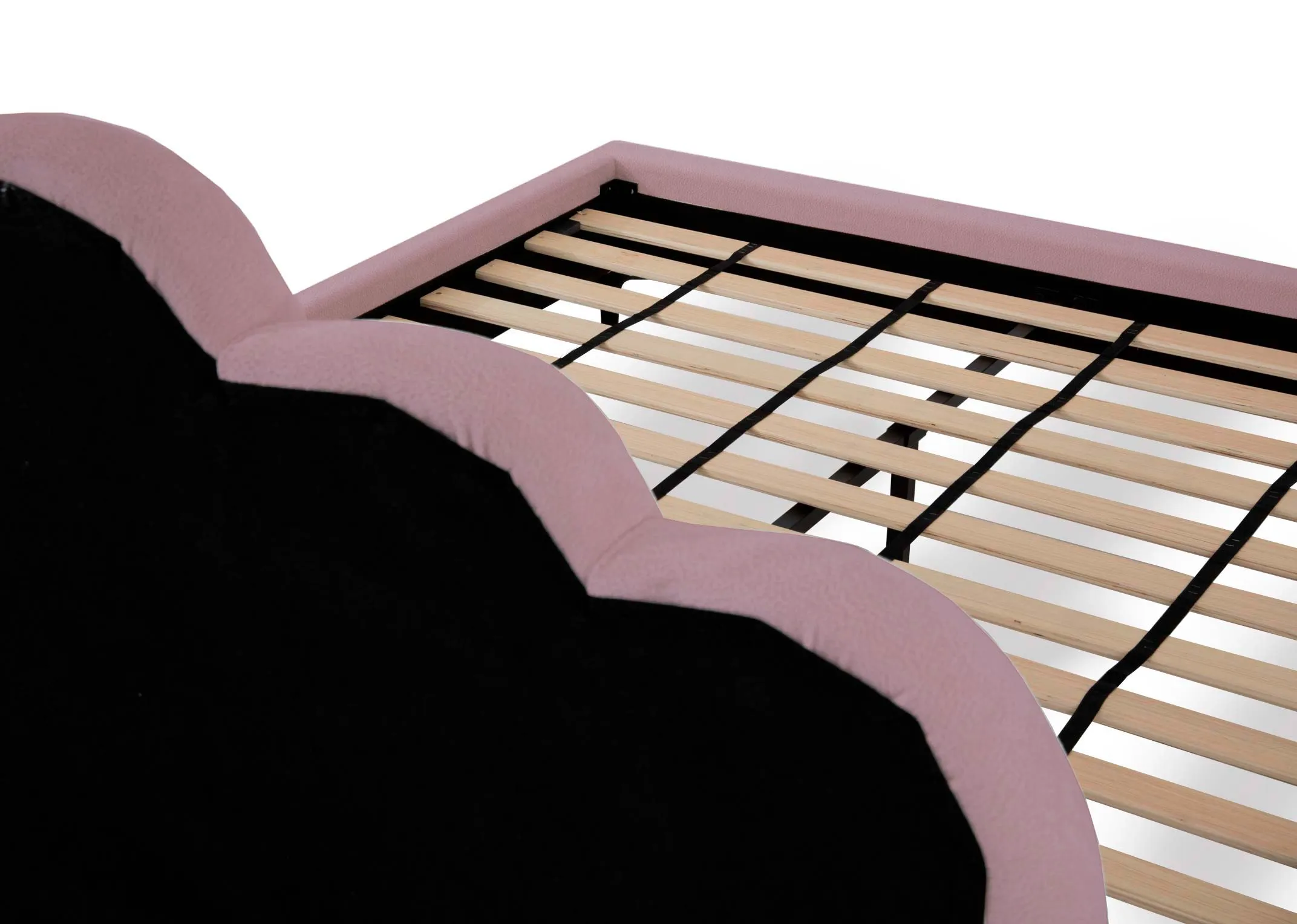 A pink bedframe with scalloped headboard from EZ Livings Fay range. Closeup of slat wood base