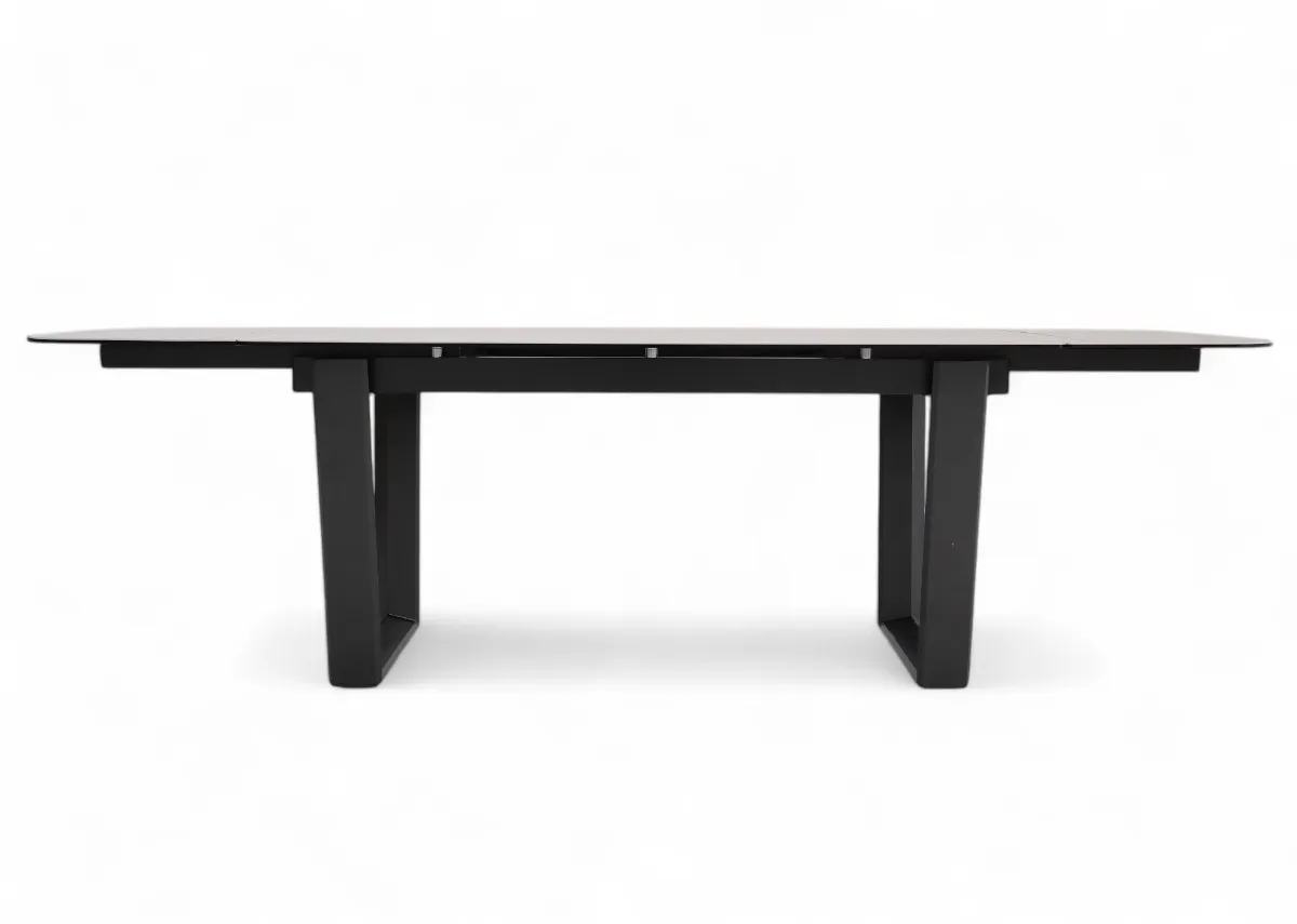 A ceramic top and metal frame dining table from EZ Livings Tempo Range. Front view of table extended