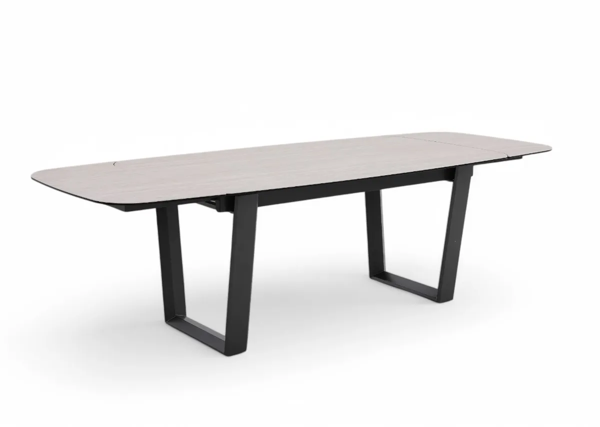 A ceramic top and metal frame dining table from EZ Livings Tempo Range. Angled view of table fully extended