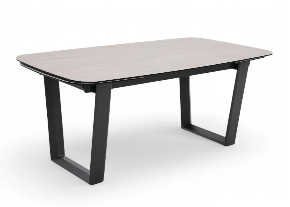 A ceramic top and metal frame dining table from EZ Livings Tempo Range.