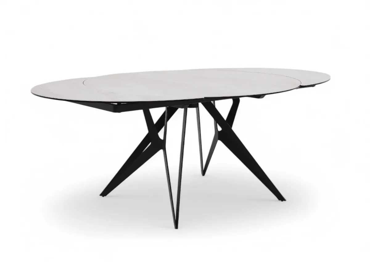 A ceramic top dining table from EZ Livings Fusion range. Angled view with extension leaf out