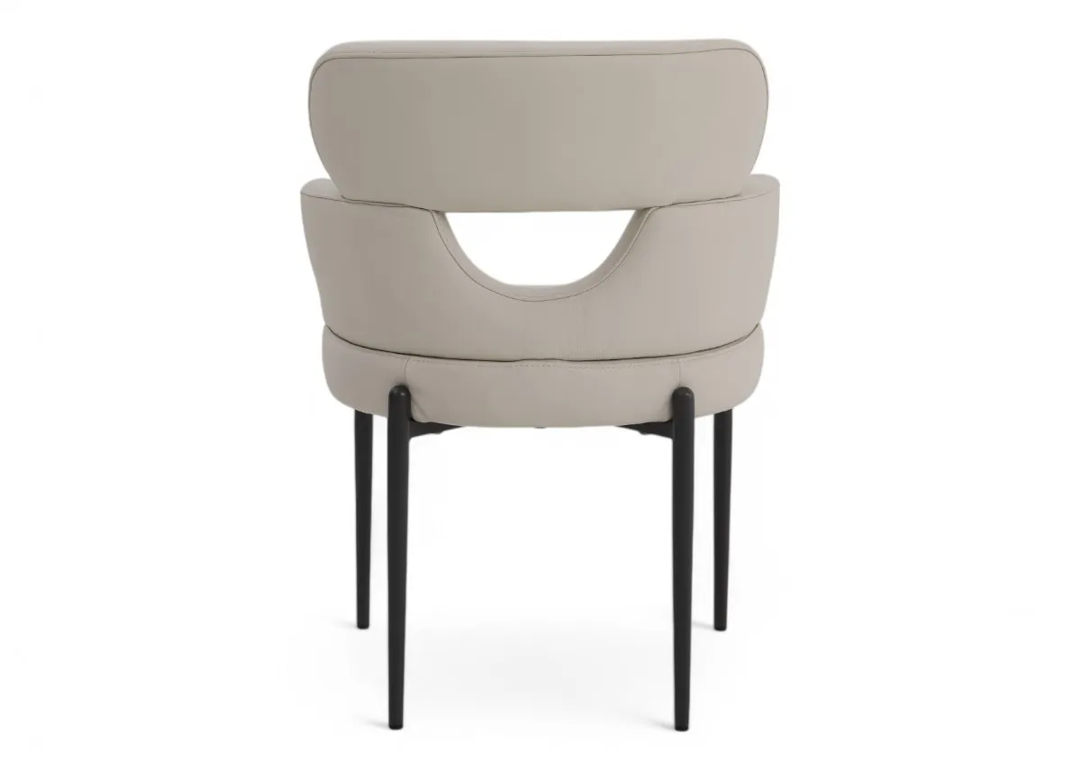 An off white leather dining chair with metal legs from EZ Livings Fusion range. Back view