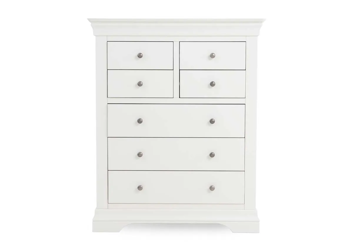 A white chest of 7 drawers from EZ Livings Dove range. Front view of 4 small and 3 large drawers.