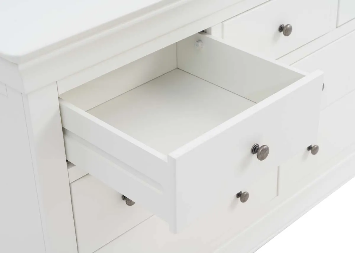A 7 drawer dresser in white from EZ Livings Dove range. Closeup of silver round handle