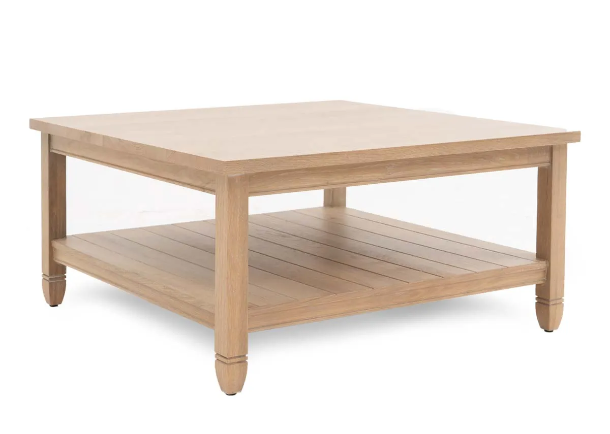 A square oak coffee table with chunky top and lower shelf from EZ Livings Dawn range. Angled view.