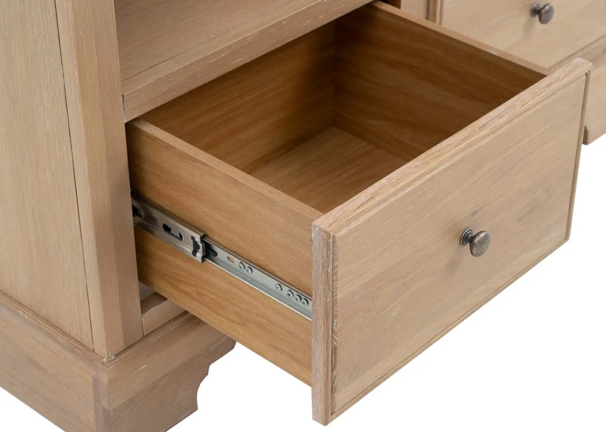 A 2 drawer oak bookcase with 4 shelves from EZ Livings Dawn range. Closeup of open drawer