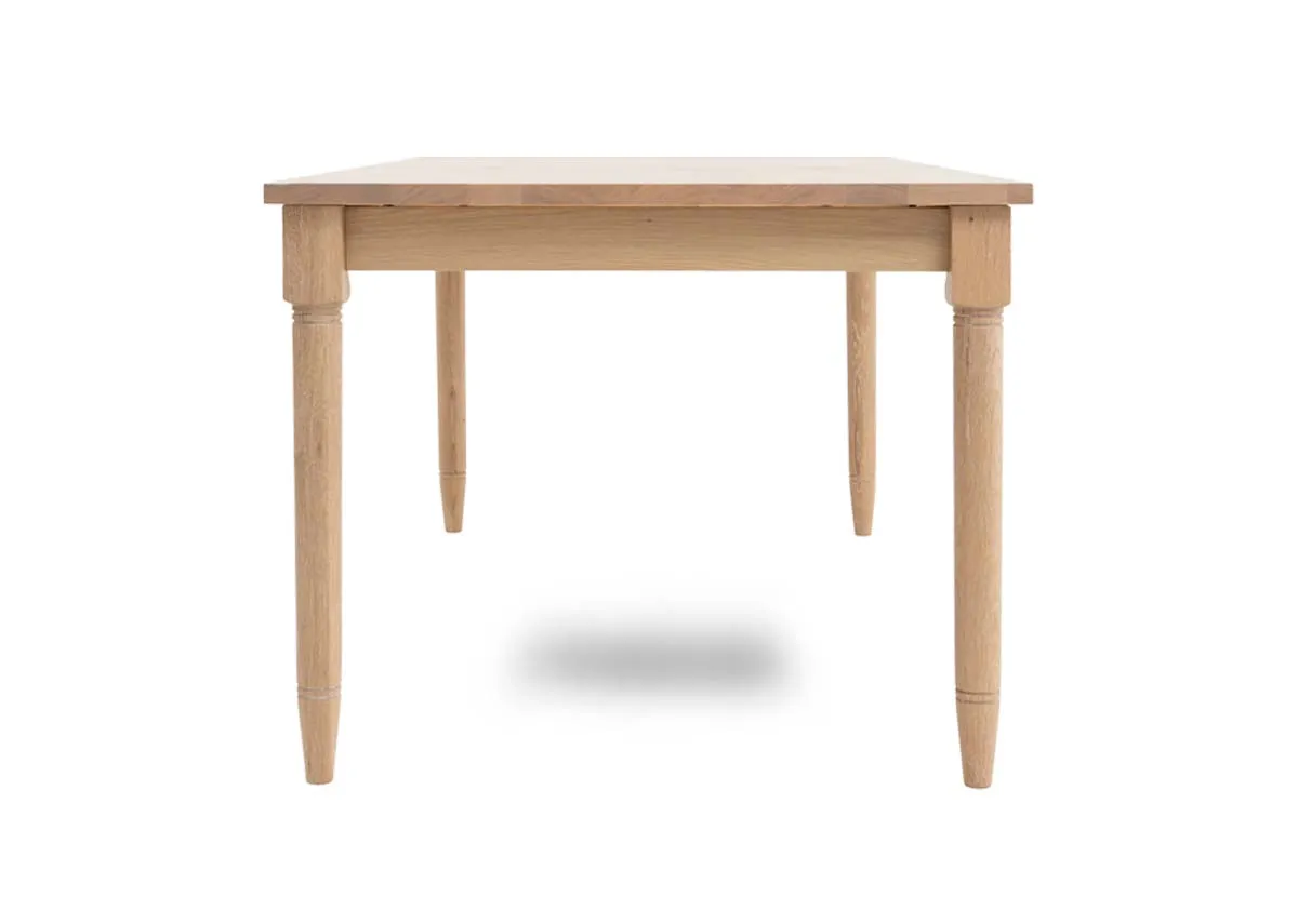 A rectangular oak dining table from EZ Livings Dawn range. Side view