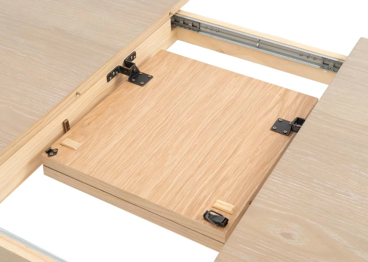 A rectangular oak dining table from EZ Livings Dawn range. Closeup of leaf for extension.