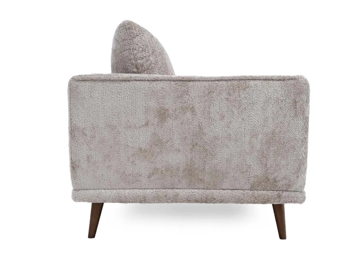 A 4 seater silver grey sofa from EZ Livings Boutique range. Side view of wide arms