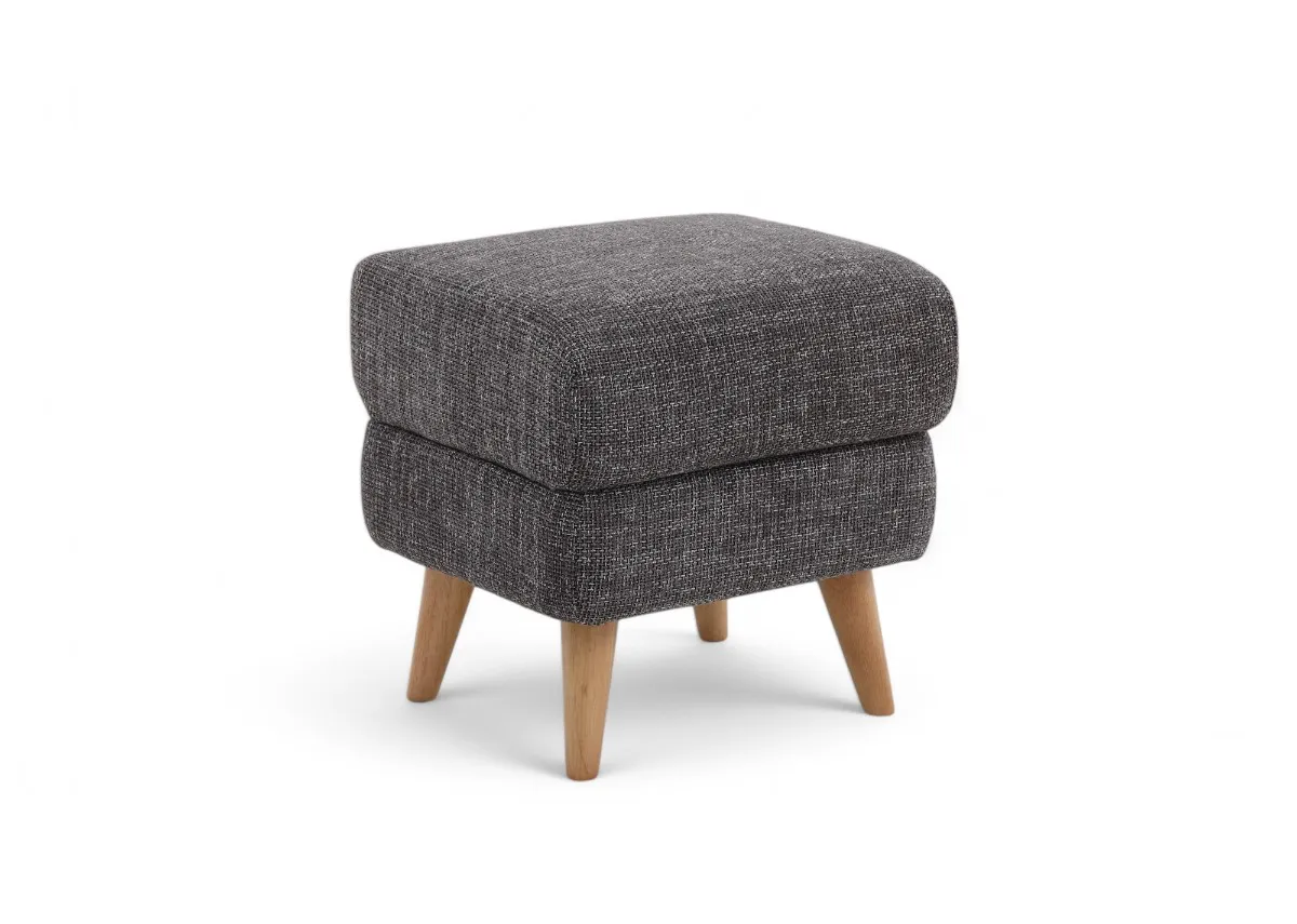 A square footstool with dark grey fabric padded seat from EZ Livings Harper range. Angled view.