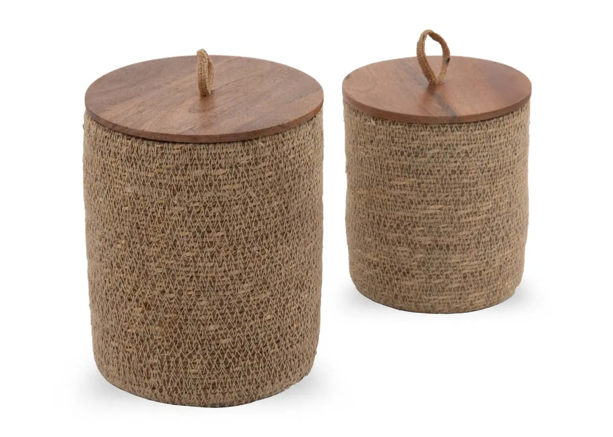 A set of 2 tall woven baskets with wood lids from EZ Livings Ava range. Angled view of looped handle to remove lid.