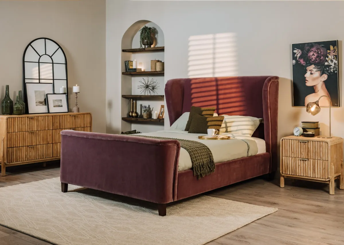 A lifestyle image of the Maison bed with Kansas rug and Milo locker with Lily print
