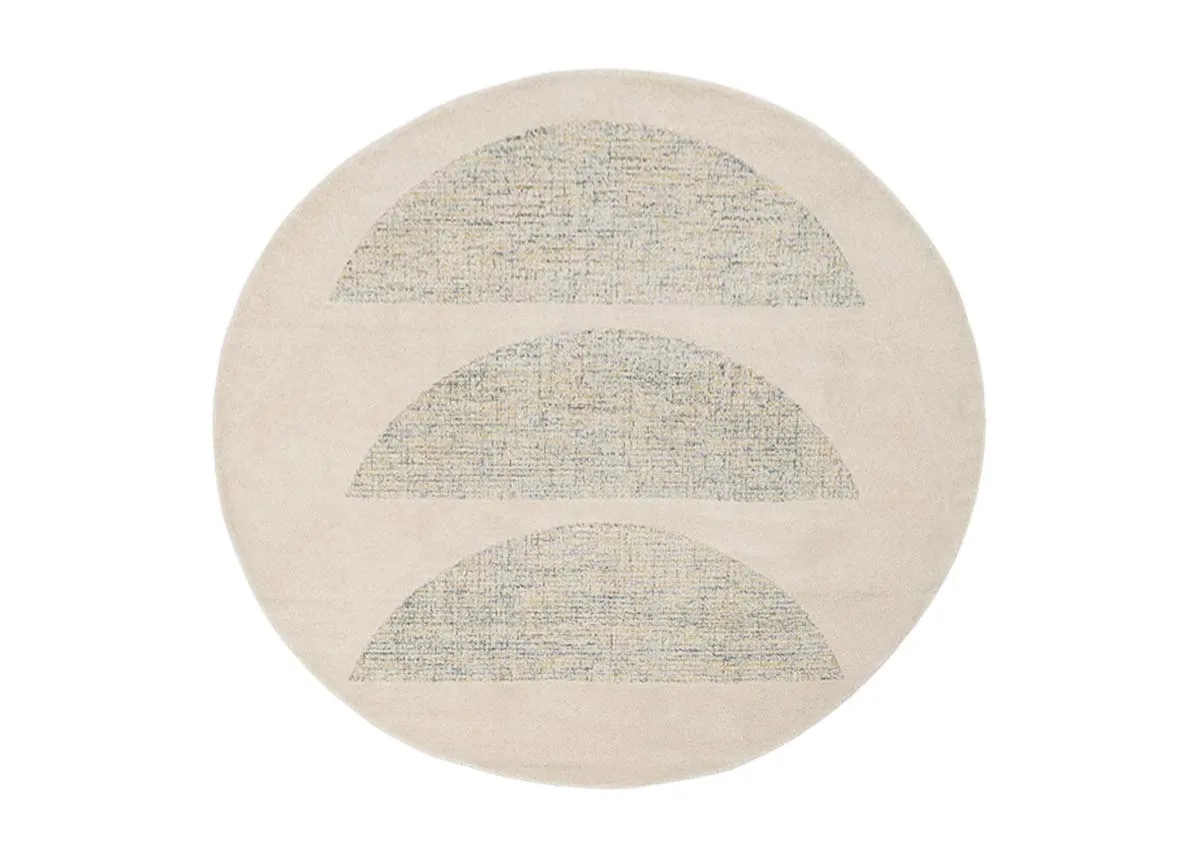 A round natural rug with 3 semi circle shapes in centre from EZ Livings Louisville range Front view