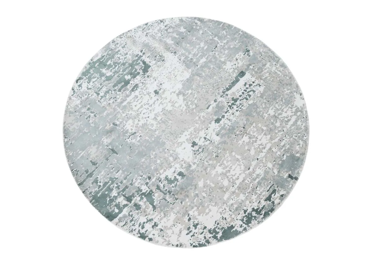A round green and ivory rug from EZ Livings Modesto range. Front view of circular shape
