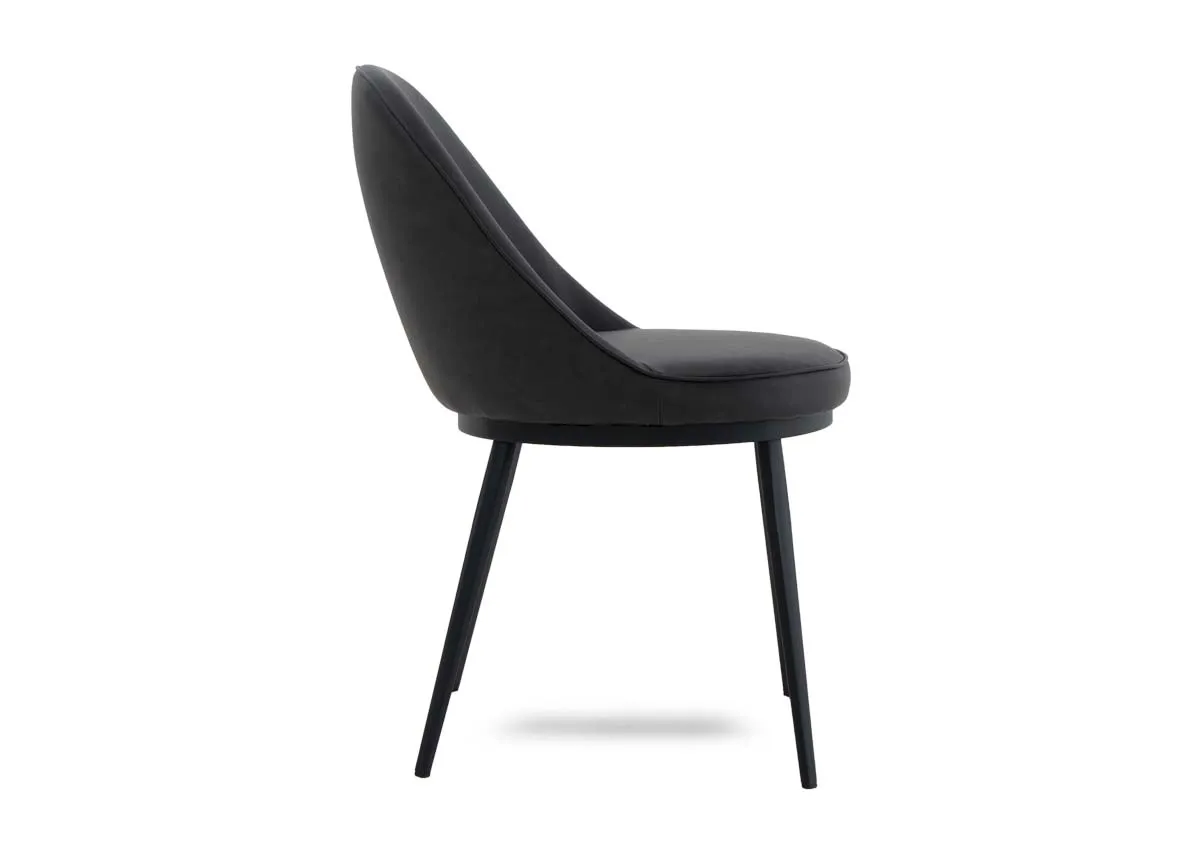 A dark grey dining chair from EZ Livings Gain range. Side view of curved seat back