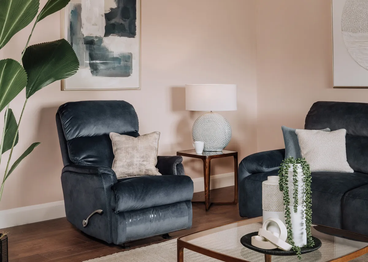 A lifestyle image of the Emily rocker with the Davina sofa bed and Cameo tables