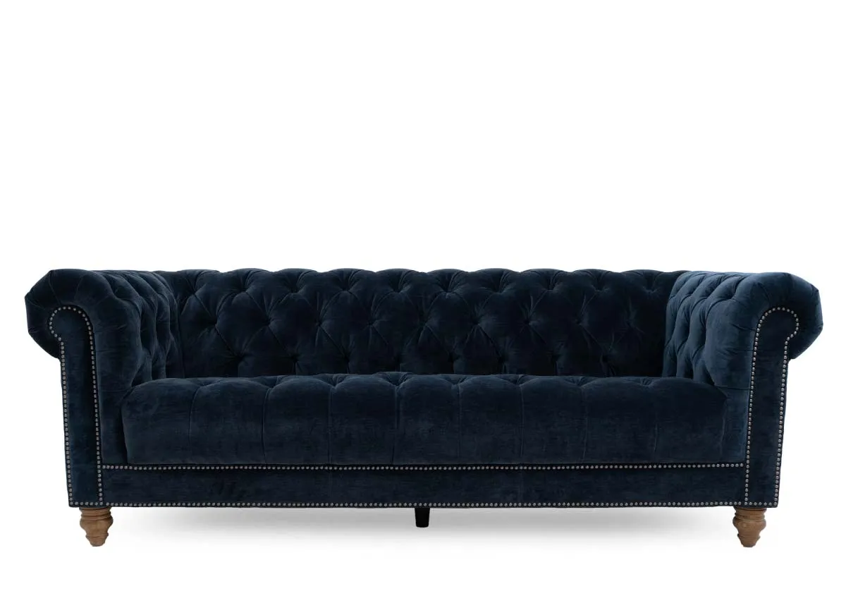 A 3.5 seater roll back sofa from EZ Livings Adare range. Front view of studded detail on sides