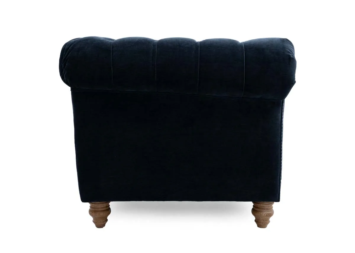 A 3.5 seater roll back sofa from EZ Livings Adare range. Side view of ash feet