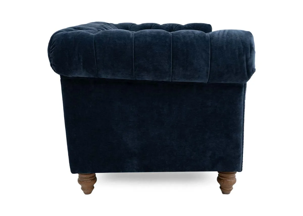 A 2 seater roll back sofa from EZ Livings Adare range. Side view of soft curved arm rests