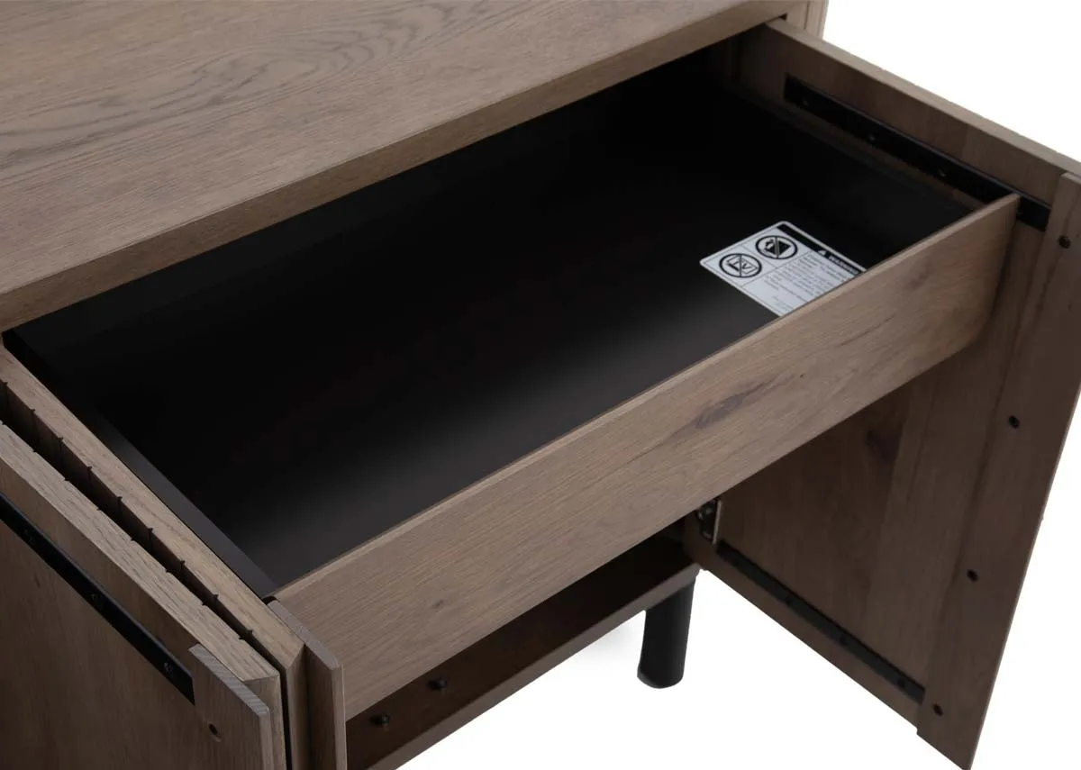 A wide grey oak sideboard with panel finish from EZ Livings Vega range. Front view of panel finish on doors