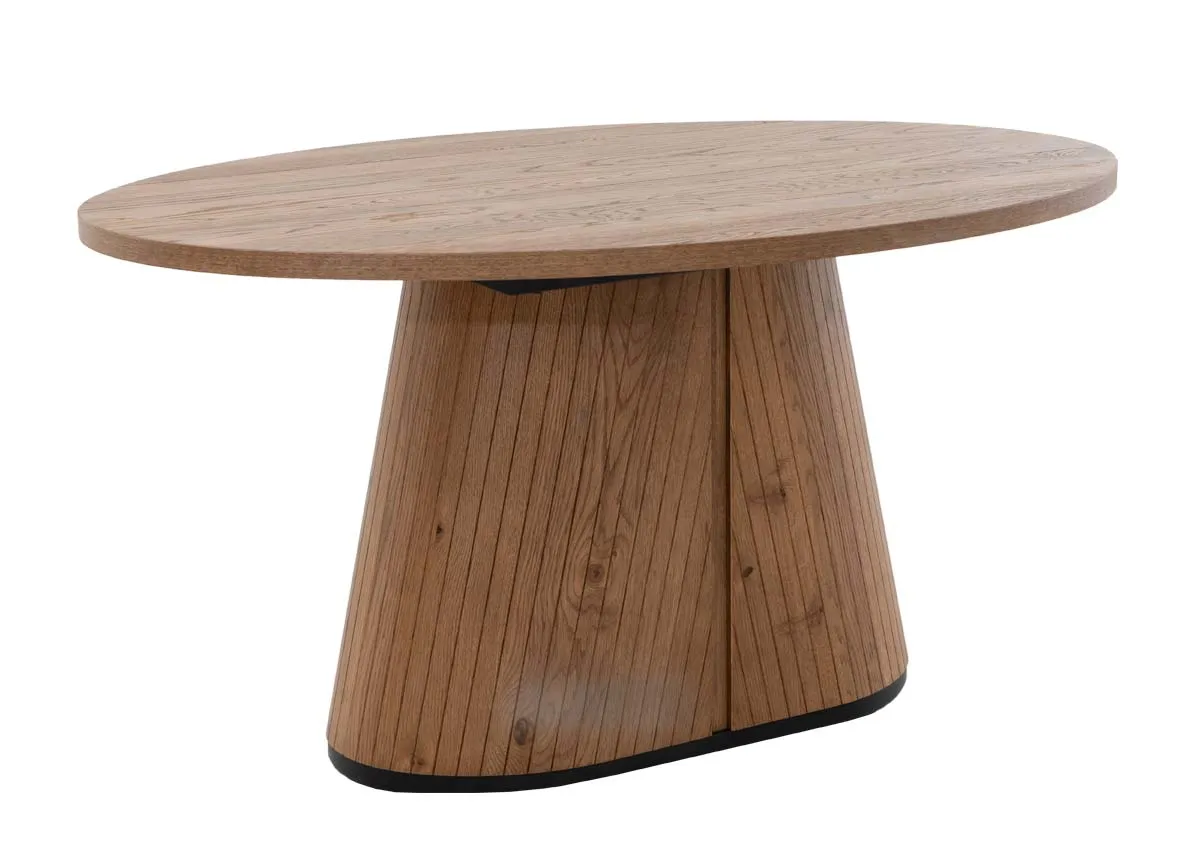 An oval dining table in rustic oak from EZ Livings Vega range. Angled view of panelling detail on base