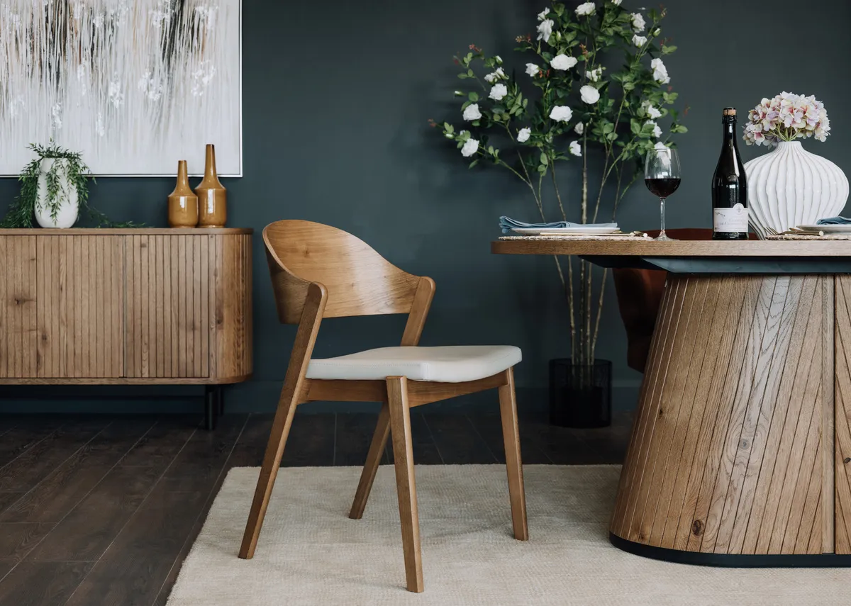 A lifestyle image of the Vega rustic dining table and chair