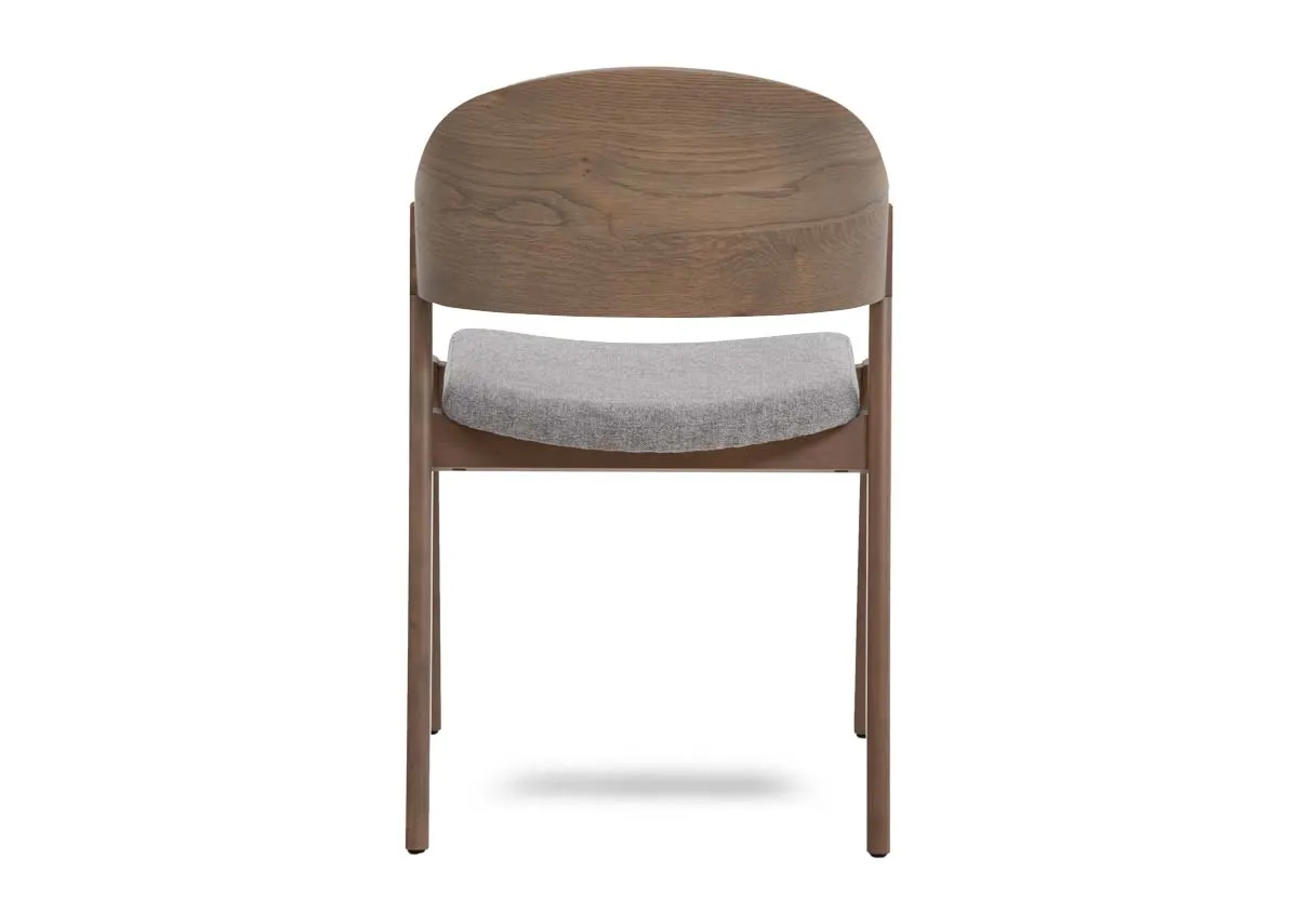 A grey oak dining chair with fabric seat from EZ Livings Vega range. Back view of curved backrest.