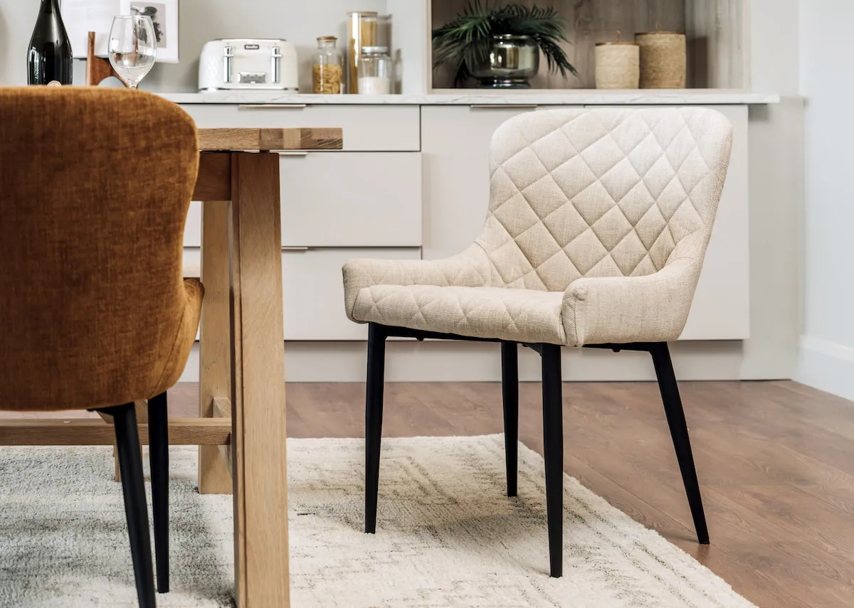 A lifestyle image of the Ottowa cream dining chair with the Albany dining table.