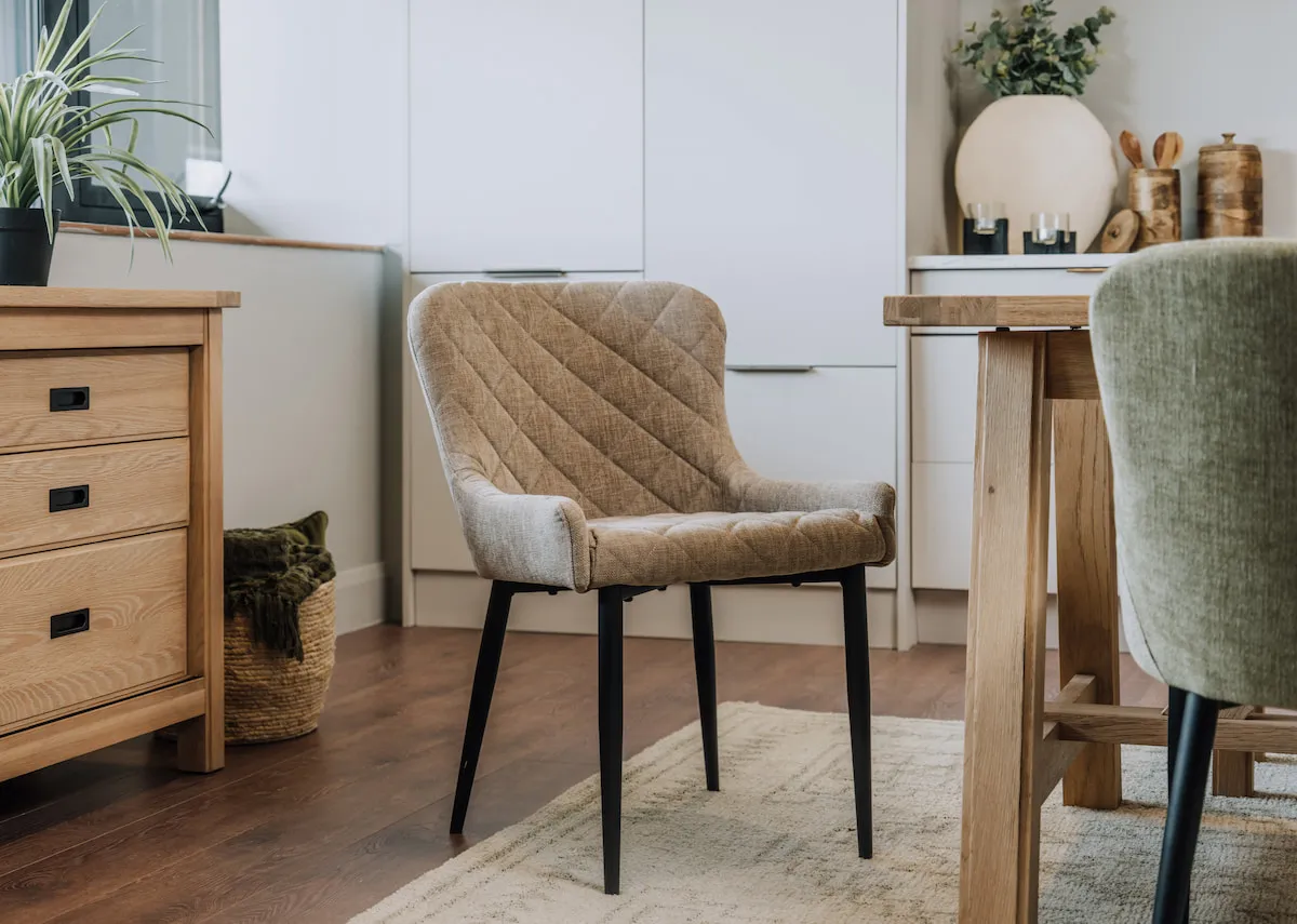 A lifestyle image of the Ottowa Taupe dining chair with albany table