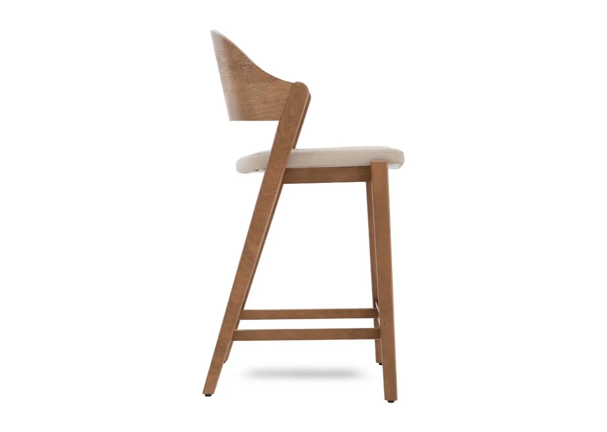 A rustic oak bar stool with ivory faux leather seat from EZ Livings Vega range. Side view of angled back leg