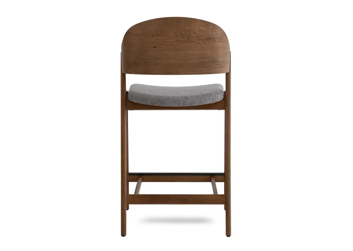 A smoked oak bar stool with grey fabric seat from EZ Livings Vega range. Back view