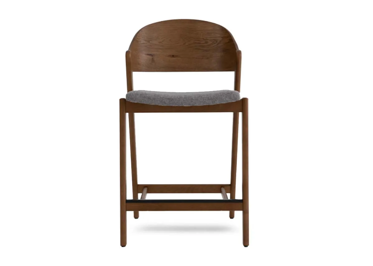 A smoked oak bar stool with grey fabric seat from EZ Livings Vega range. Front view