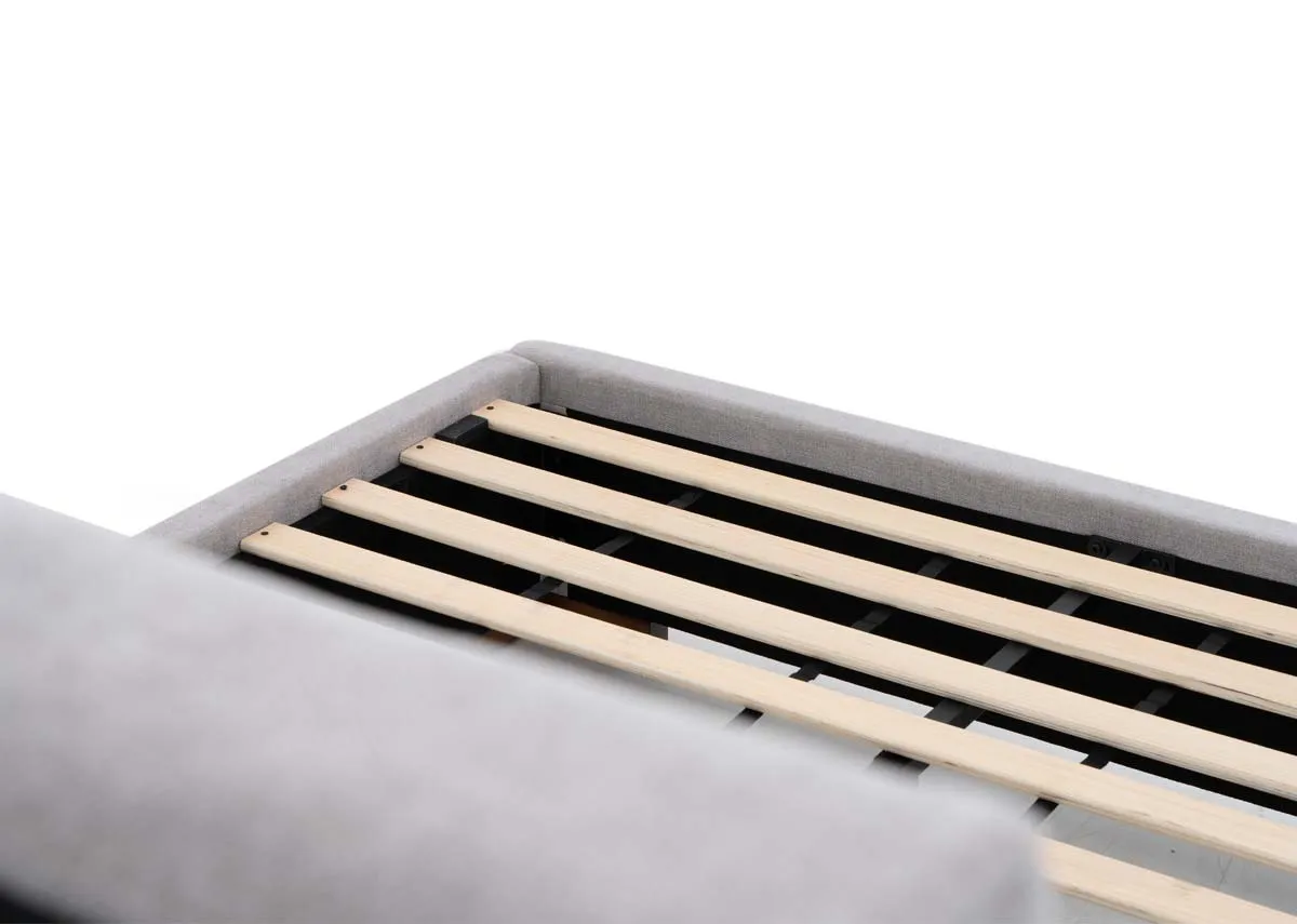 A light grey 4ft6 bed from EZ Livings Liberty range. Closeup of slat wood base.